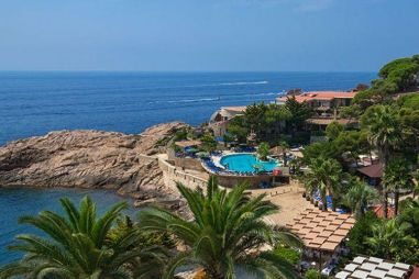 Experience the harmonious blend of Ayurvedic wellness and the breathtaking beauty of the Mediterranean coast at Hotel Port Salvi in Spain, your ultimate European destination for relaxation and rejuvenation | PureandCure.com