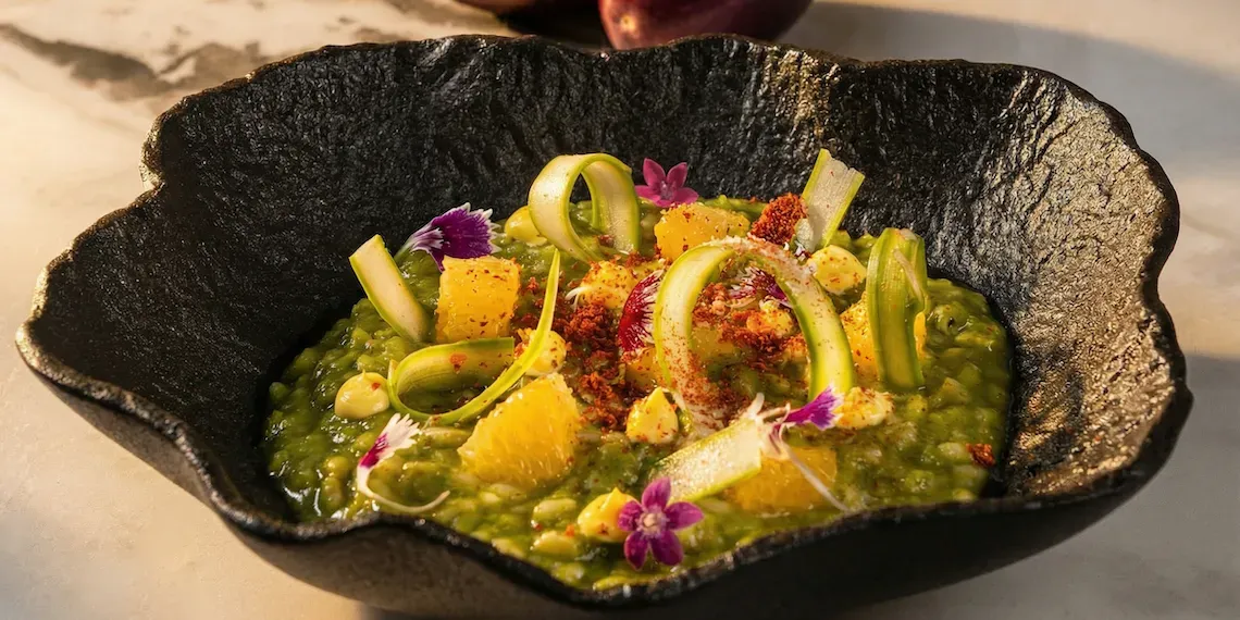plate with food, risotto and vegetables and flowers