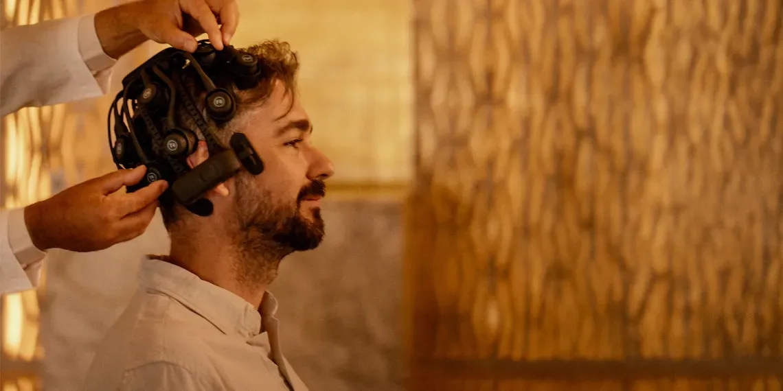 man with machine on his head for brain checks