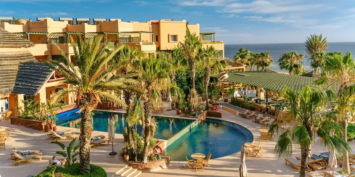 hotel pool palm trees