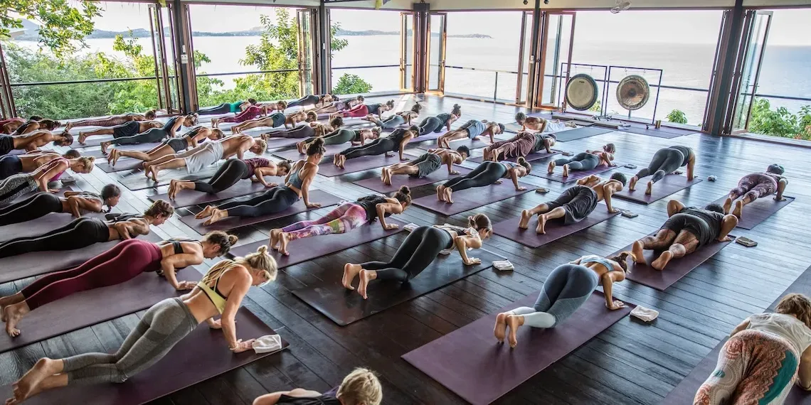 group of people doing yoga