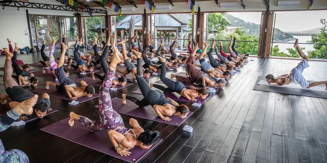 group of people doing yoga