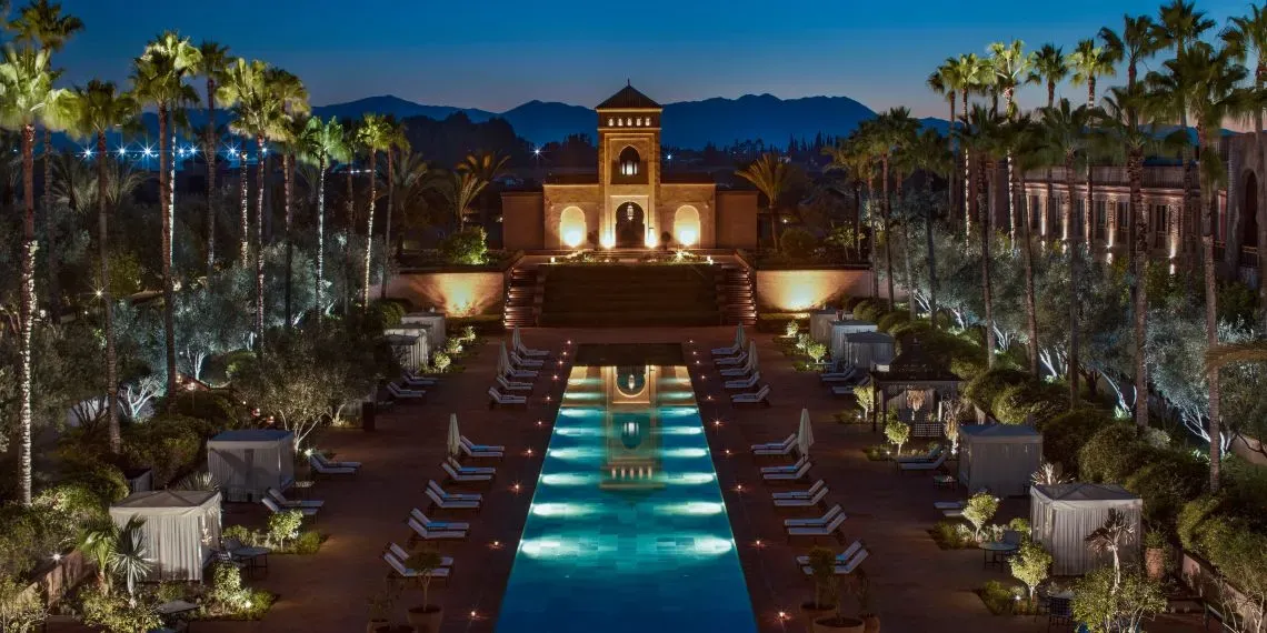 Swimming pool Selman Marrakech by night