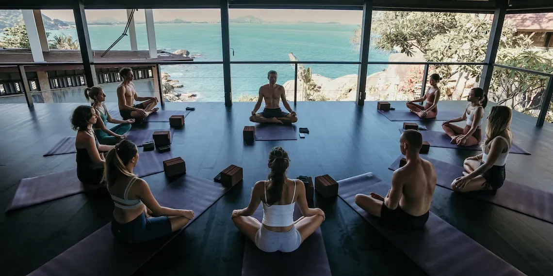 group meditation with sea view