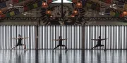 three people doing yoga