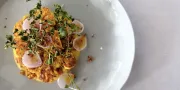 egg dish with onion on white plate