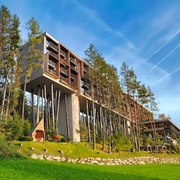 hotel high between the trees and blue skies